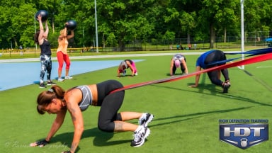 Group workout session with resistance bands